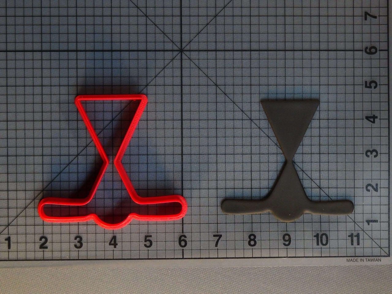 Hockey Sticks and Puck Silhouette 266-C391 Cookie Cutter